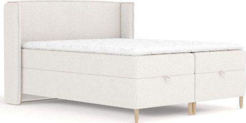 Krémová boxspring postel s úložným prostorem 180x200 cm Monpelli – Maison de Rêve